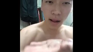 Korean boy eating own cum